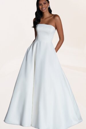 Our exclusive Bridal dresses wedding dress bride wearing wedding dress posing in her dream wedding dress gown Vaughan bridal shop White Lace Bridal Couture